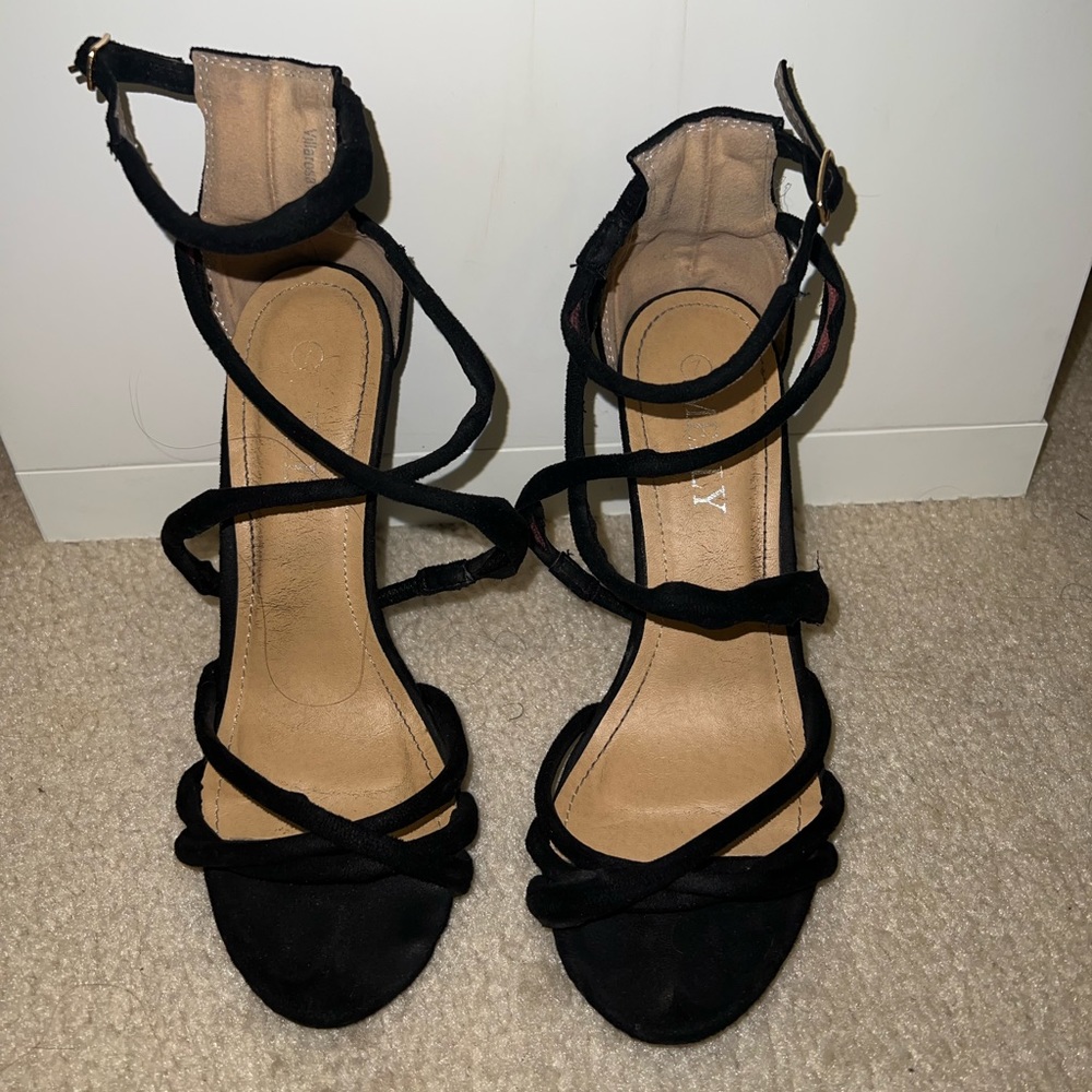 Strapped black heels